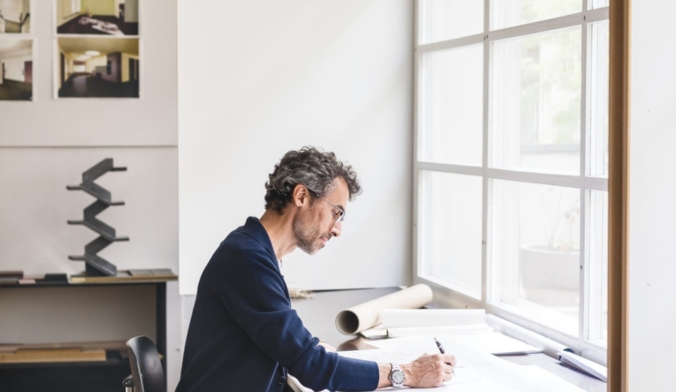 Architect at drawing table